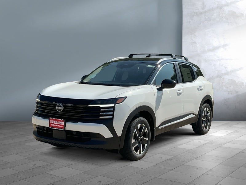 2026 Nissan Kicks SV in Aspen White Tricoat/Super Black — front three-quarter view