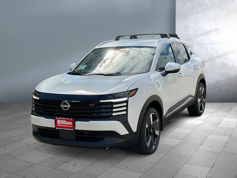 2025 Nissan Kicks SR in Aspen White Tricoat — front three-quarter view