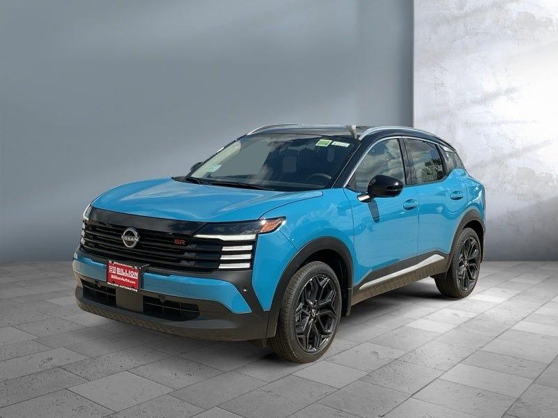 2026 Nissan Kicks SR in Arctic Ice Blue Metallic/Super Black — front three-quarter view
