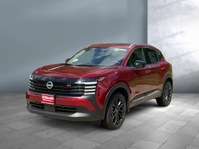 2026 Nissan Kicks SR in Scarlet Ember Tintcoat — front three-quarter view
