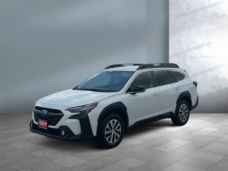 2024 Subaru Outback Premium in Crystal White Pearl — front three-quarter view